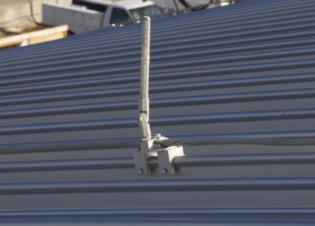 Lightning protection installed on a metal roof S-5 clamps