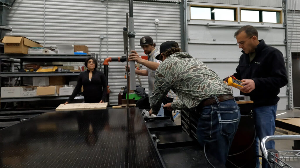 Engineers testing PV attachment technology for UL 3741 certification